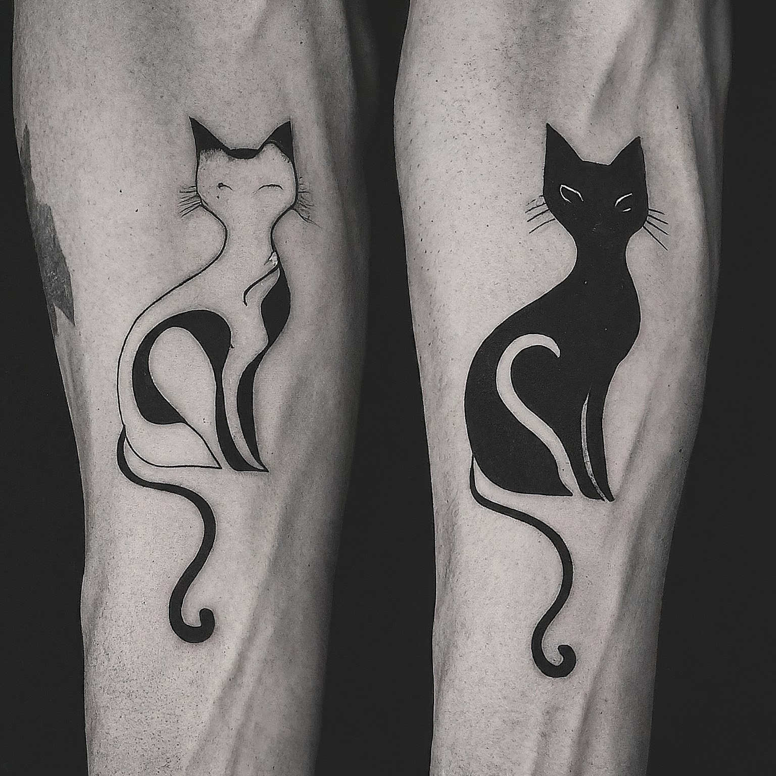 Abstract Cats tattoo