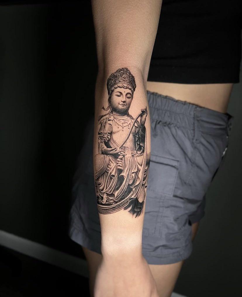 buddha-tattoo-on-fingers-200224
