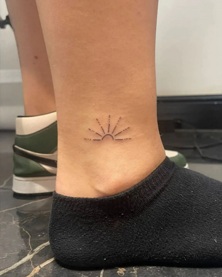 The Rich Symbolism and Cultural Meaning of Rising Sun Tattoos ...