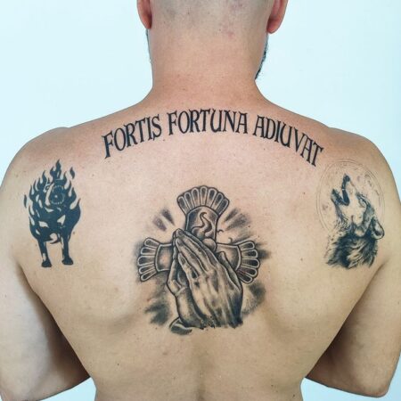 Unveiling the Symbolism: The Meaning Behind John Wick's Tattoos